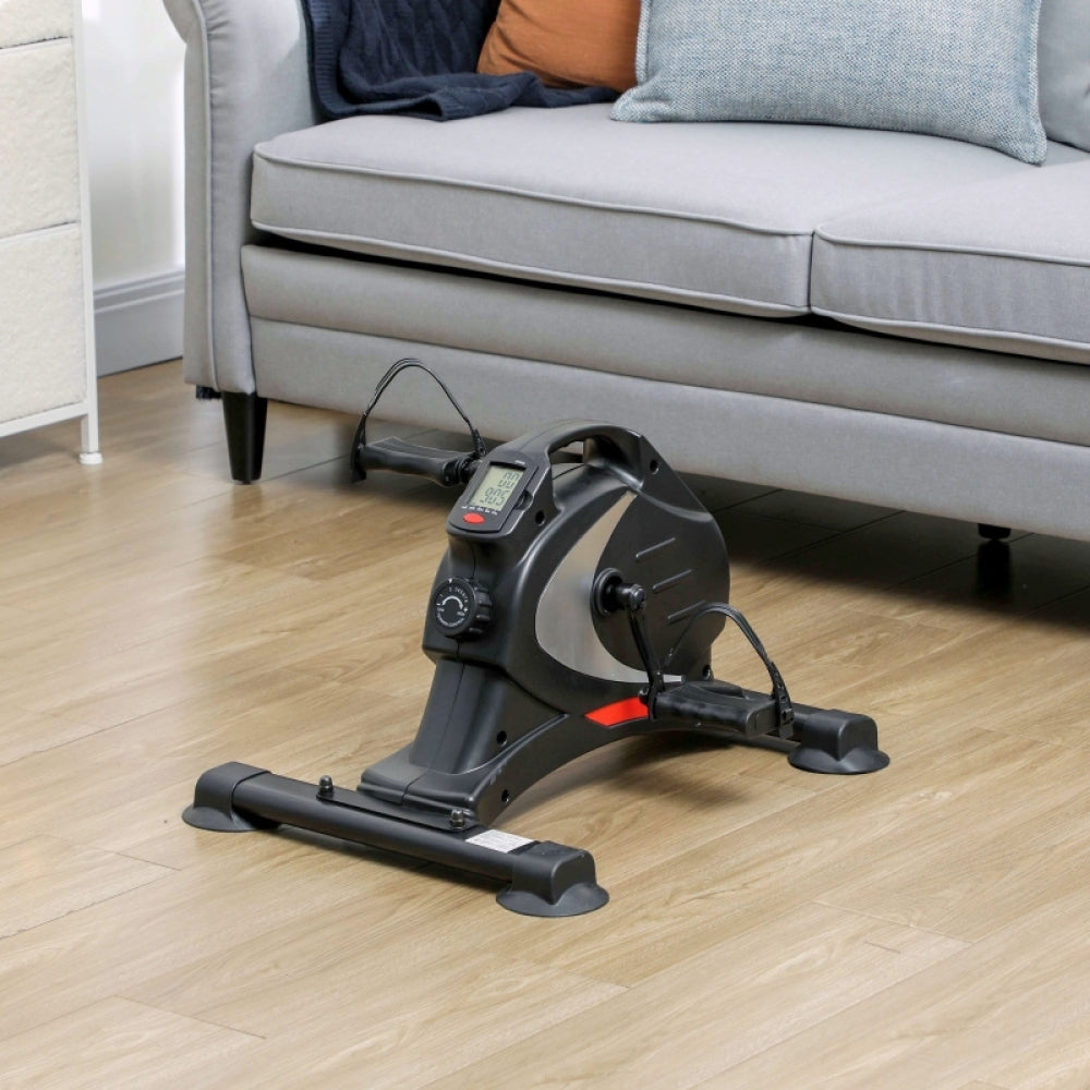 Beintrainer im Wohnzimmer: Kompaktes und leises Fitnessgerät in Schwarz