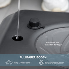 Detailaufnahme der schwarzen Basis mit Einfüllöffnung für Wasser/Sand und Verschlusskappe.