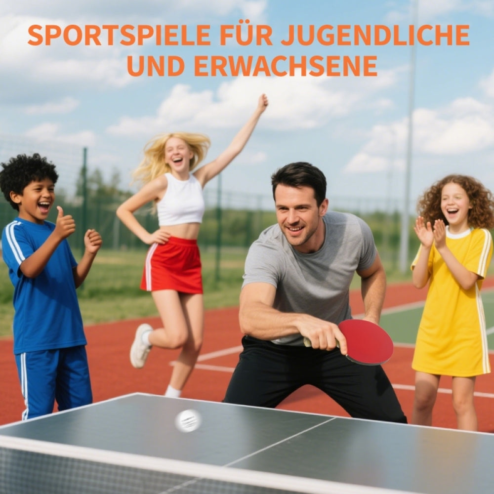 Eine Gruppe von Freunden und Familie lacht und feiert bei einem Tischtennis-Match im Freien.