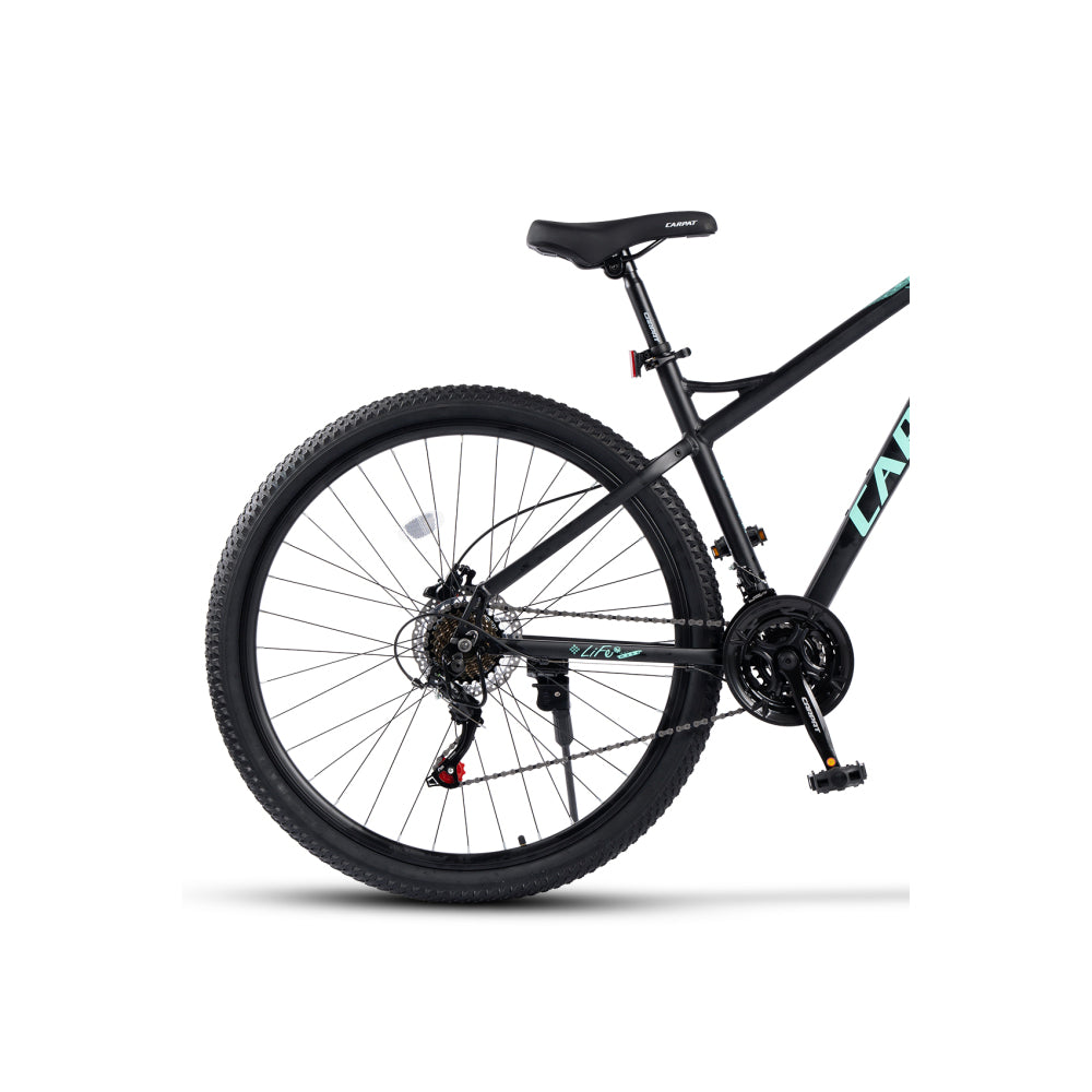 Detailaufnahme des Shimano 21-Gang Schaltwerks und der 14-28Z Kassette für präzis3-fach Kurbelsatz mit Kettenschutzring für kraftsparendes Fahren im Gelände.e Gangwechsel.
