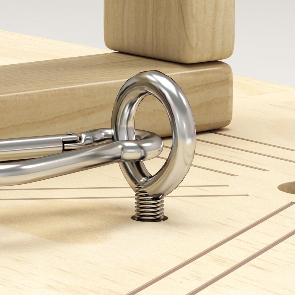 Fokus auf den stabilen Metall-Karabiner und die Ringöse zur sicheren Befestigung der Widerstandsbänder.