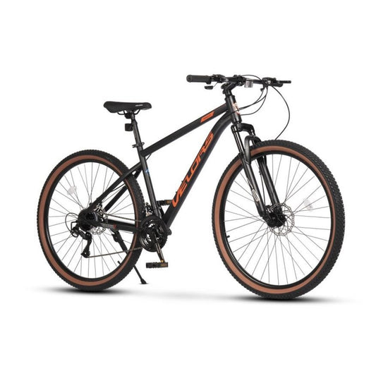 Schwarzes 29 Zoll Hardtail-Mountainbike mit orangen Akzenten und Reifen mit brauner Seitenwand (Skinwall)