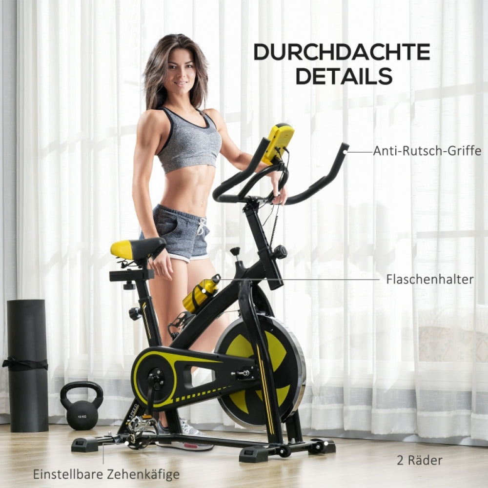 H101 Heimtrainer Gelb – Frau trainiert zu Hause mit Flaschenhalter und Transportrollen