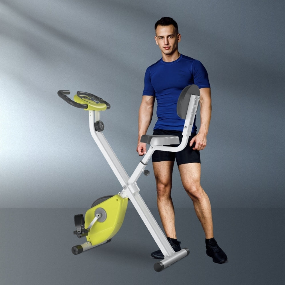 H103 Heimtrainer Grün – Mann beim Training auf dem faltbaren X-Bike