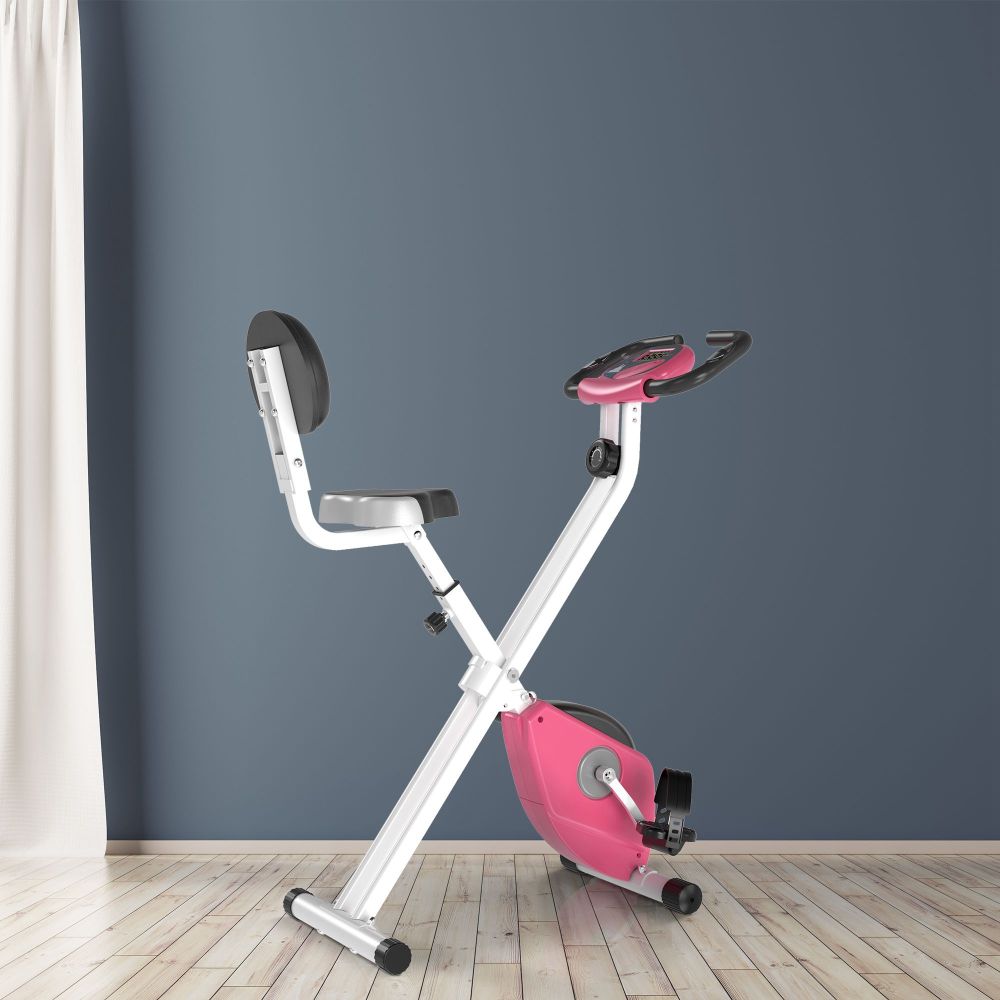 H103 Heimtrainer Pink – Faltbares X-Bike im Wohnzimmer aufgestellt